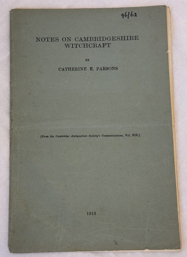 Grey/ blue paper booklet with black text reading, "Notes on Cambridgeshire Witchcraft by Catherine E. Parsons" Beneath this, in square brackets text reads "From the Cambridge Antiquarian Society's Communications, Vol. XIX." Finally at the bottom of the cover is the date reading "1915."